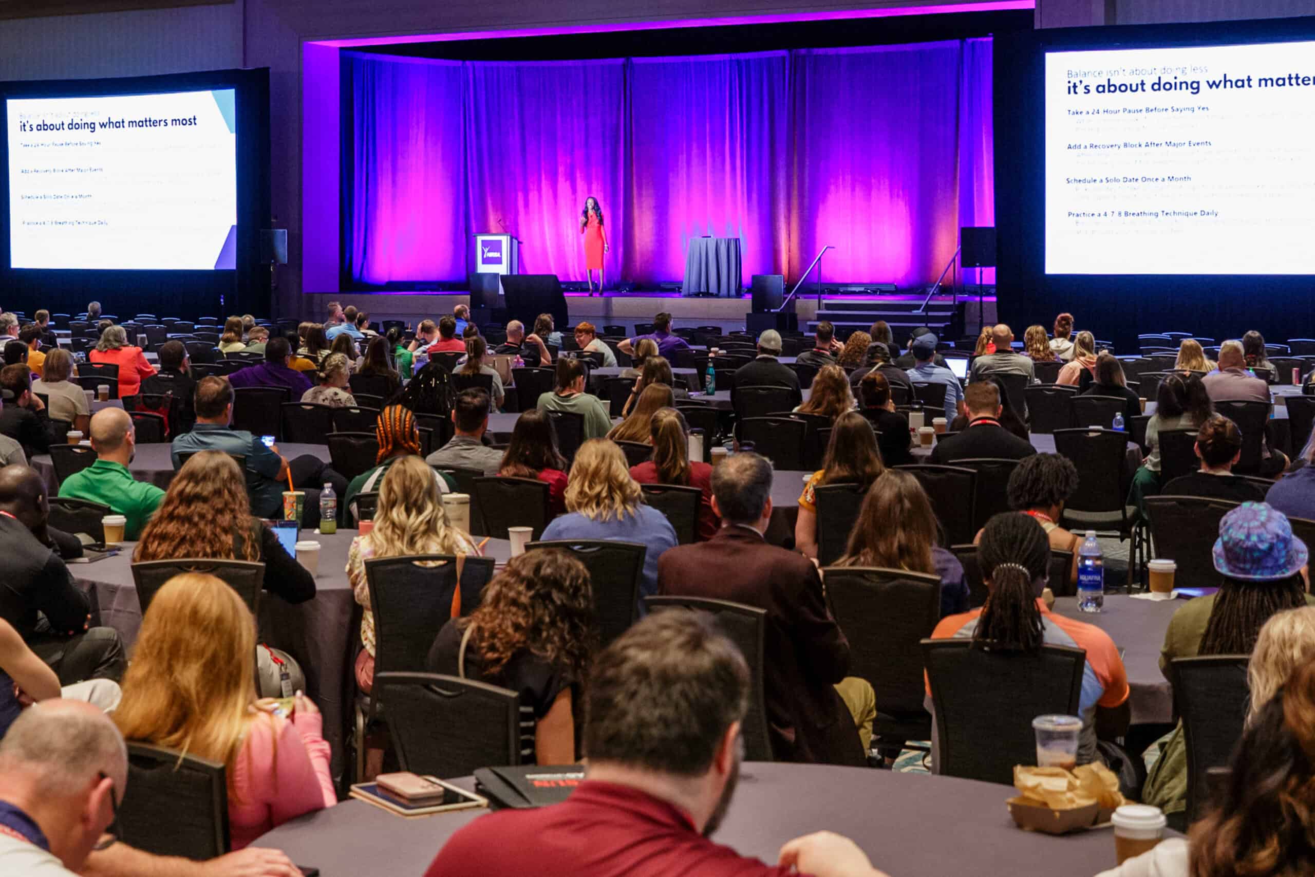 A large crowd sitting at a NIRSA event