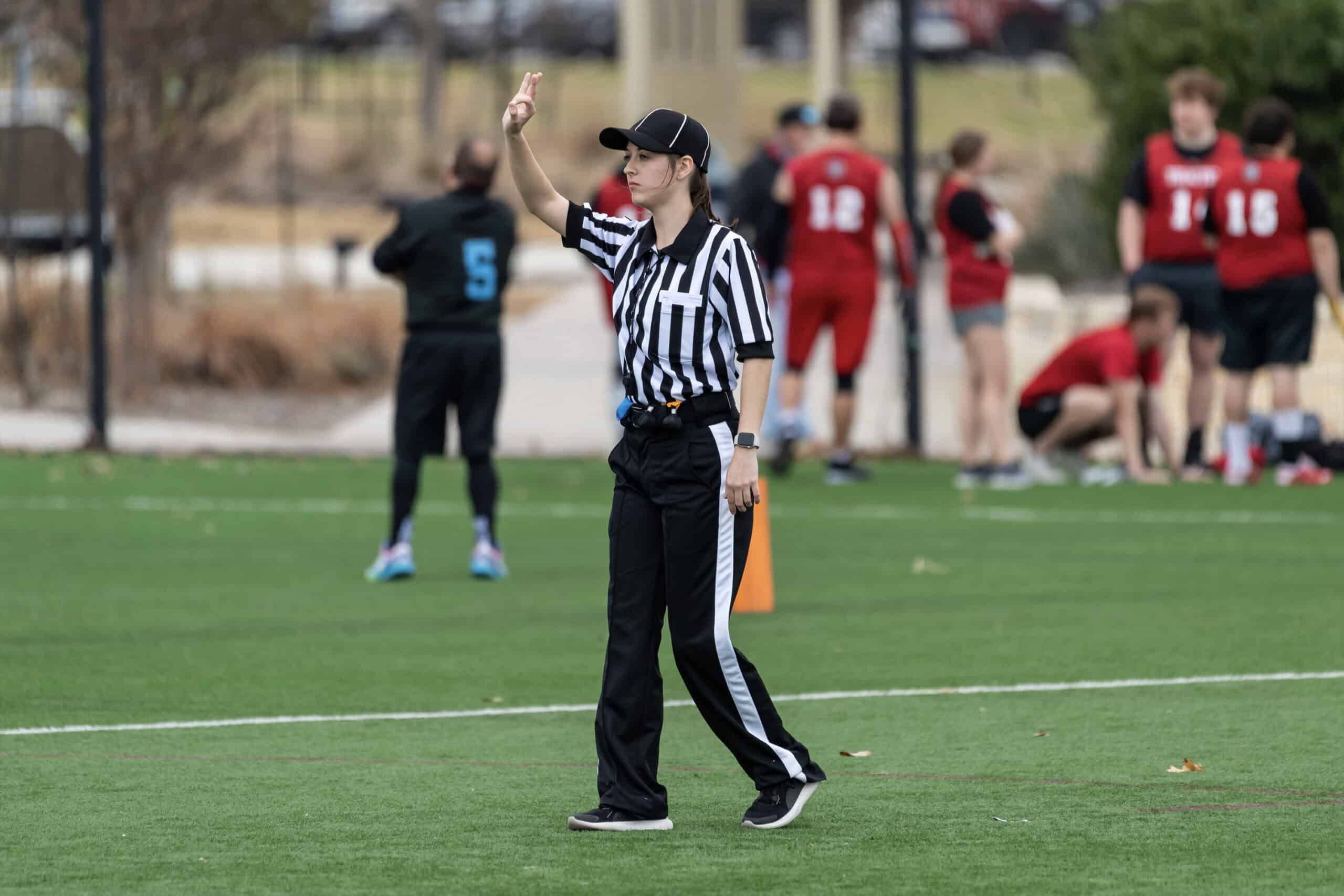 Woman official at a sport event